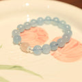 DIY aquamarine bracelet kit with Chinese Fengjiu fox design and pink crystals.
