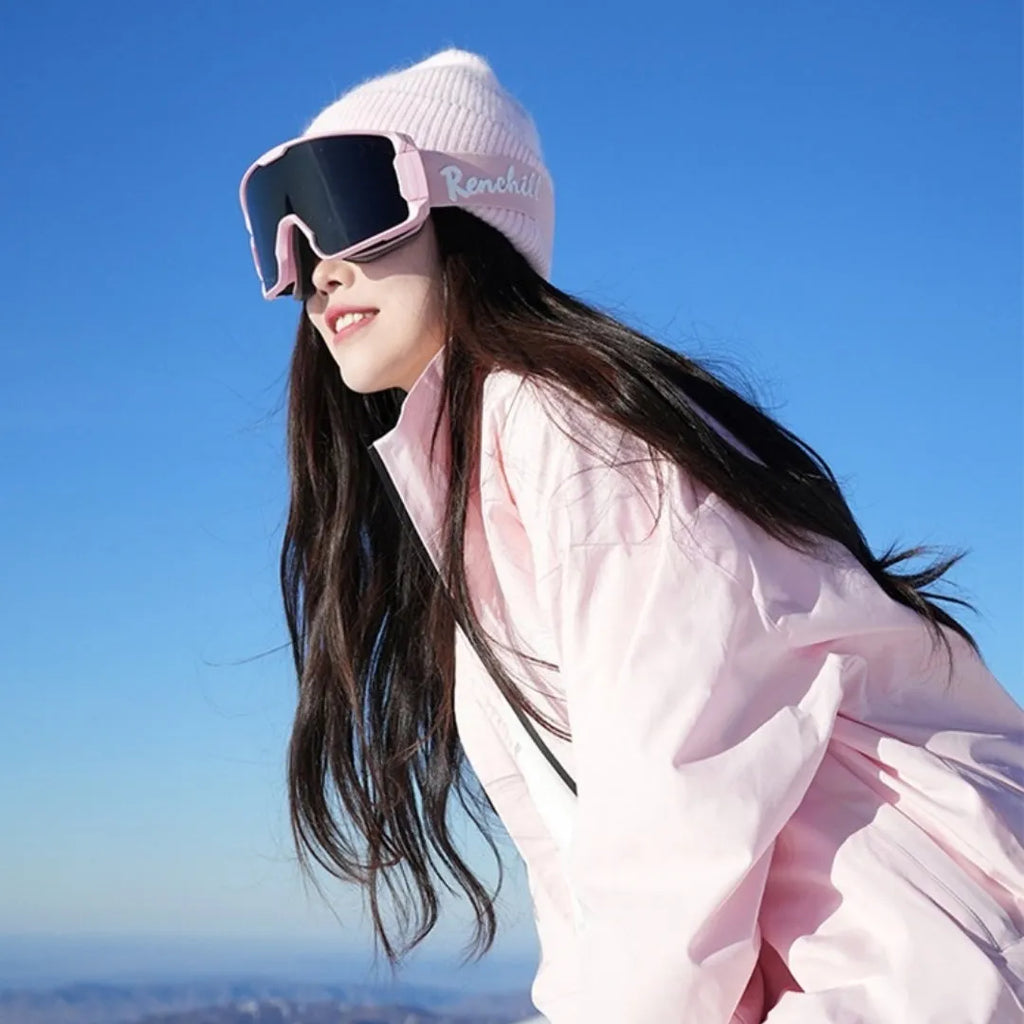 Winter waterproof ski suit set with jacket and trousers in cotton blend fabric, available in pink or black colours