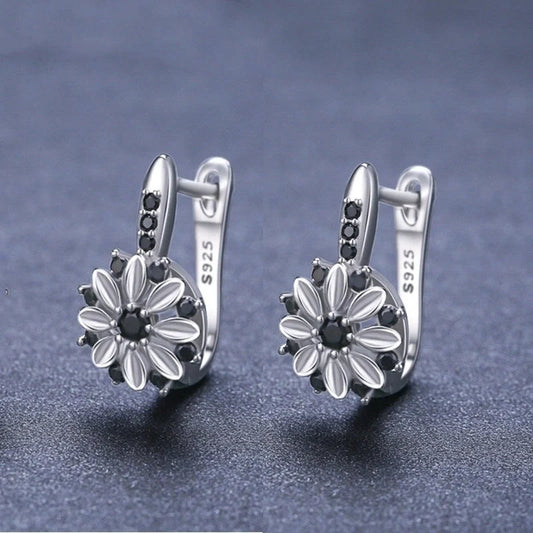 Copper inlaid zircon flower ear clips for women, black floral design