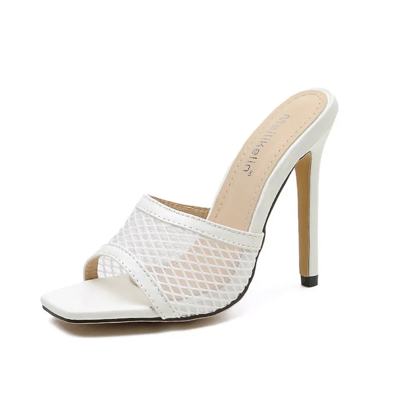 Women's white fish mouth sandals with leather insole and side air detail, side view