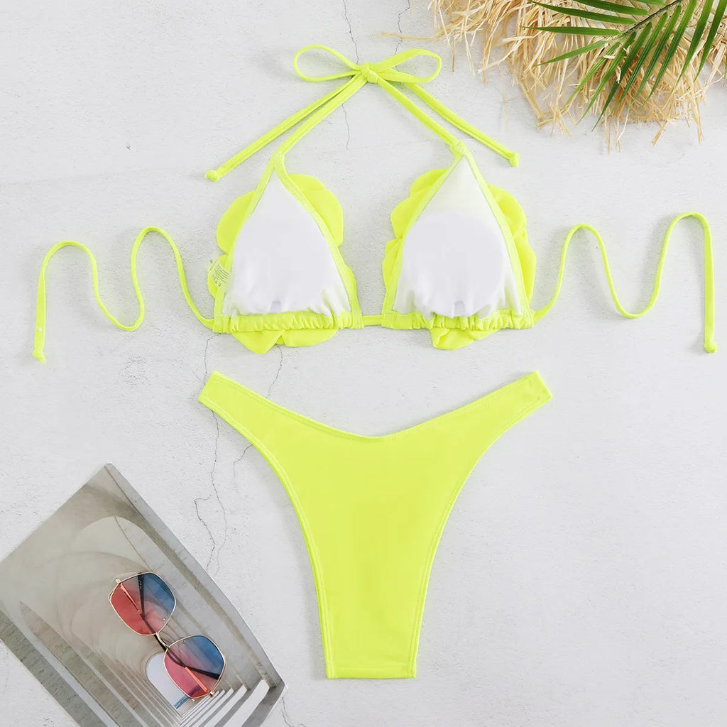 Low waist bikini swimsuit with 3D flower design in solid colour