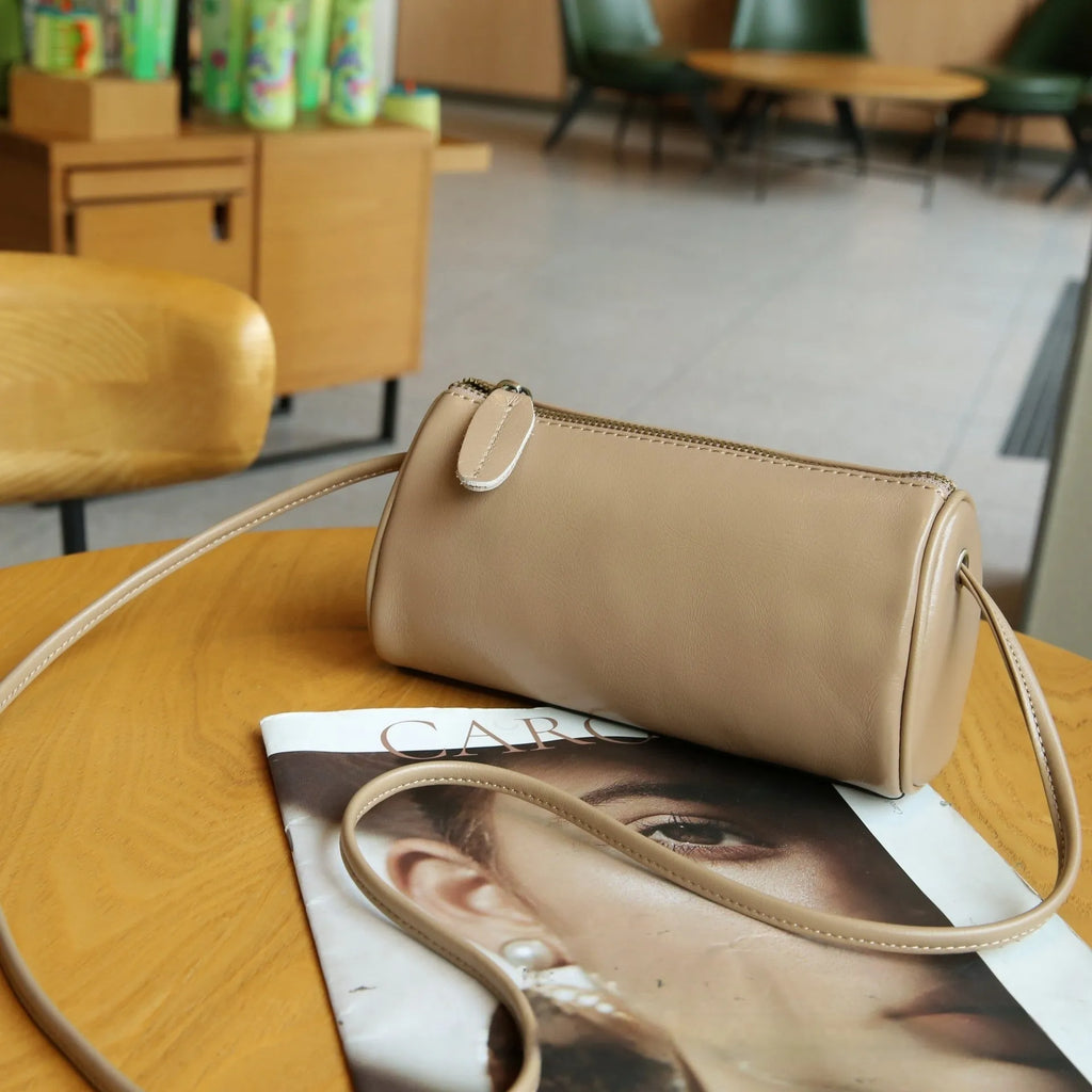 Genuine leather women's pillow crossbody bag in black, 20cm by 8cm by 15cm, with inner patch pocket, retro style