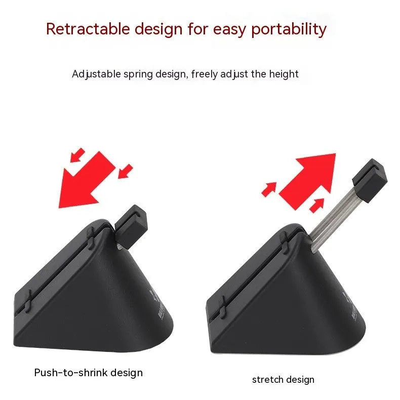 Black and white ABS plastic mouse cable holder bracket for wired gaming mice on a desk.