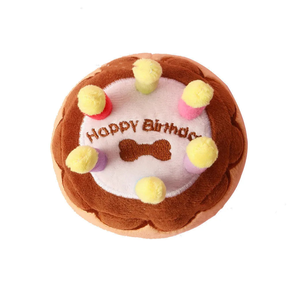Brown pet plush toy shaped like a birthday cake with a candle, 40g, for dogs to chew and play