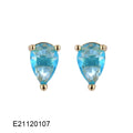 A pair of gold-plated drop earrings with candy-coloured pear-shaped zircon stones on a simple setting.