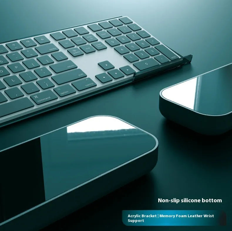 Double sided keyboard and mouse pad with memory foam wrist support on anti-slip resin base