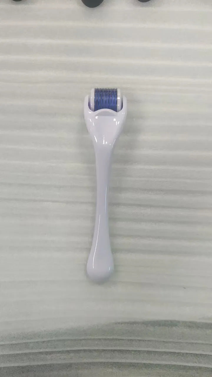 540 needle microneedle derma roller with colour wheel on black handle, showing 0.25mm specification.