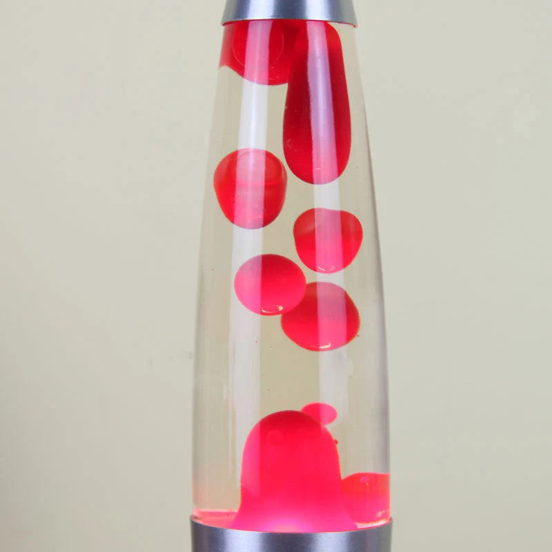 Modern 33cm lava lamp with vibrant wax colours on a wooden table