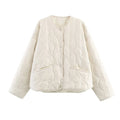 Women's bow quilted coat in black with straight cut, medium thickness polyester fabric, regular sleeves, 50 cm length