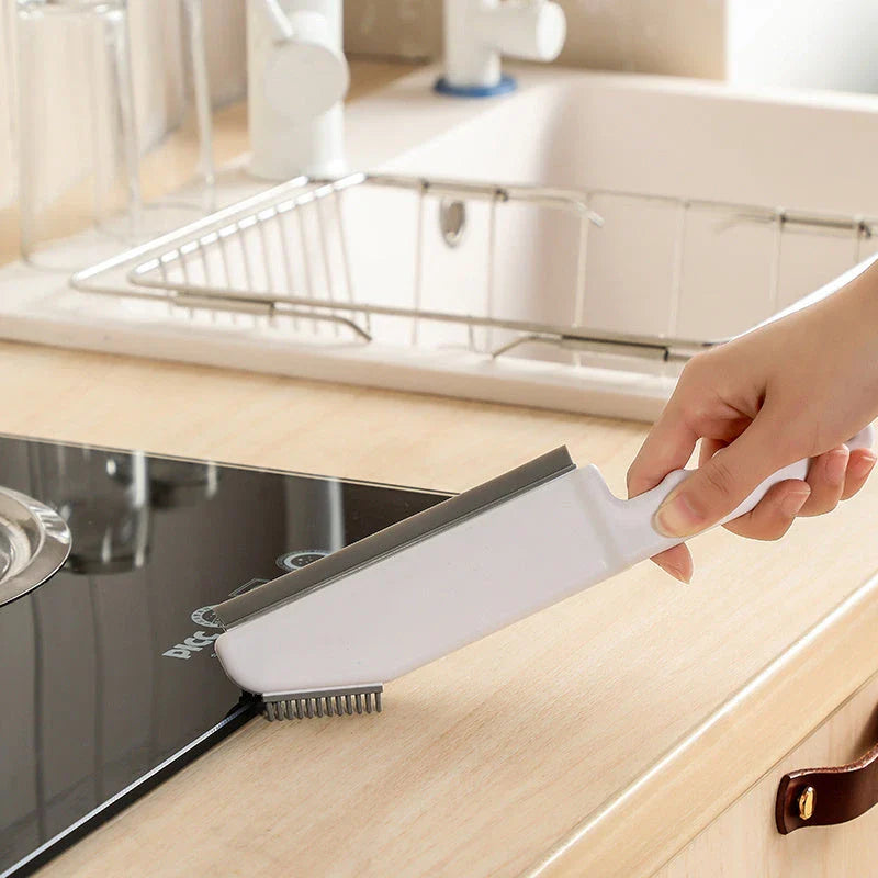 Versatile all-purpose cleaning brush with soft bristles, side scraper, and small head for accessing tight spaces in Kiwi homes