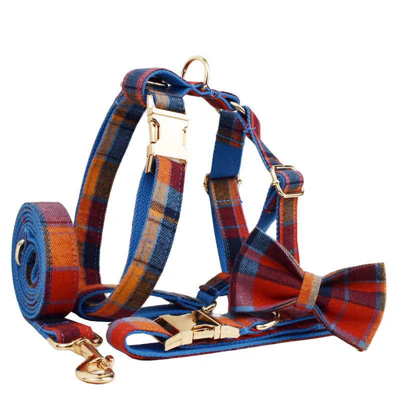 Four-piece dog accessory set with fabric collar, matching lead, decorative bow tie, and coordinating vest