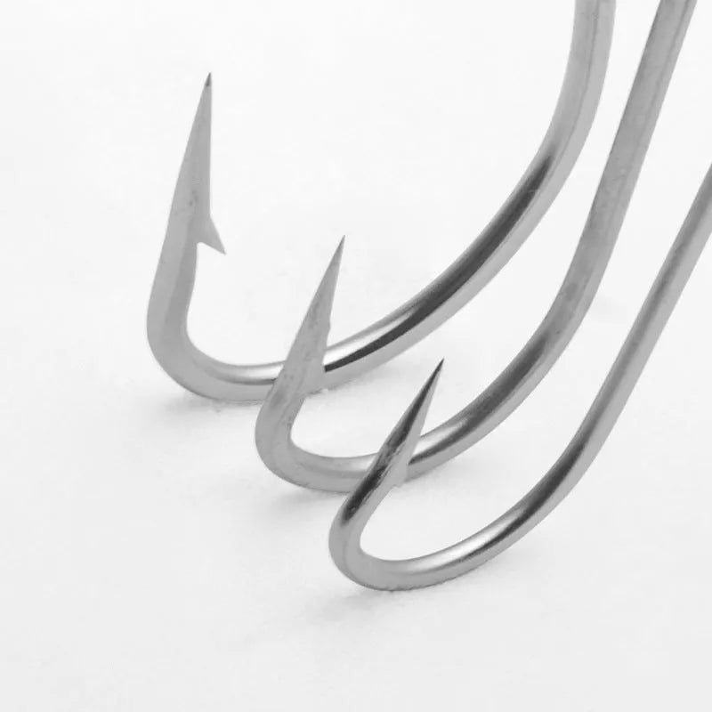 Selection of stainless steel alloy fishing hooks for sea fishing in multiple styles.