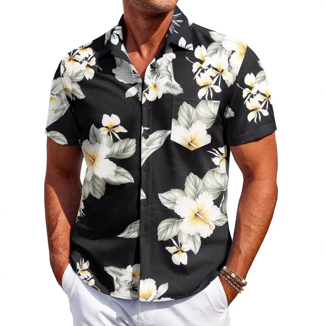 Man wearing a slim-fit Hawaiian pattern short-sleeve shirt in a casual setting.