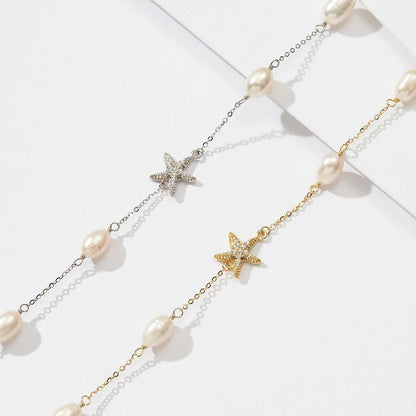 Sterling silver necklace with freshwater pearl starfish design