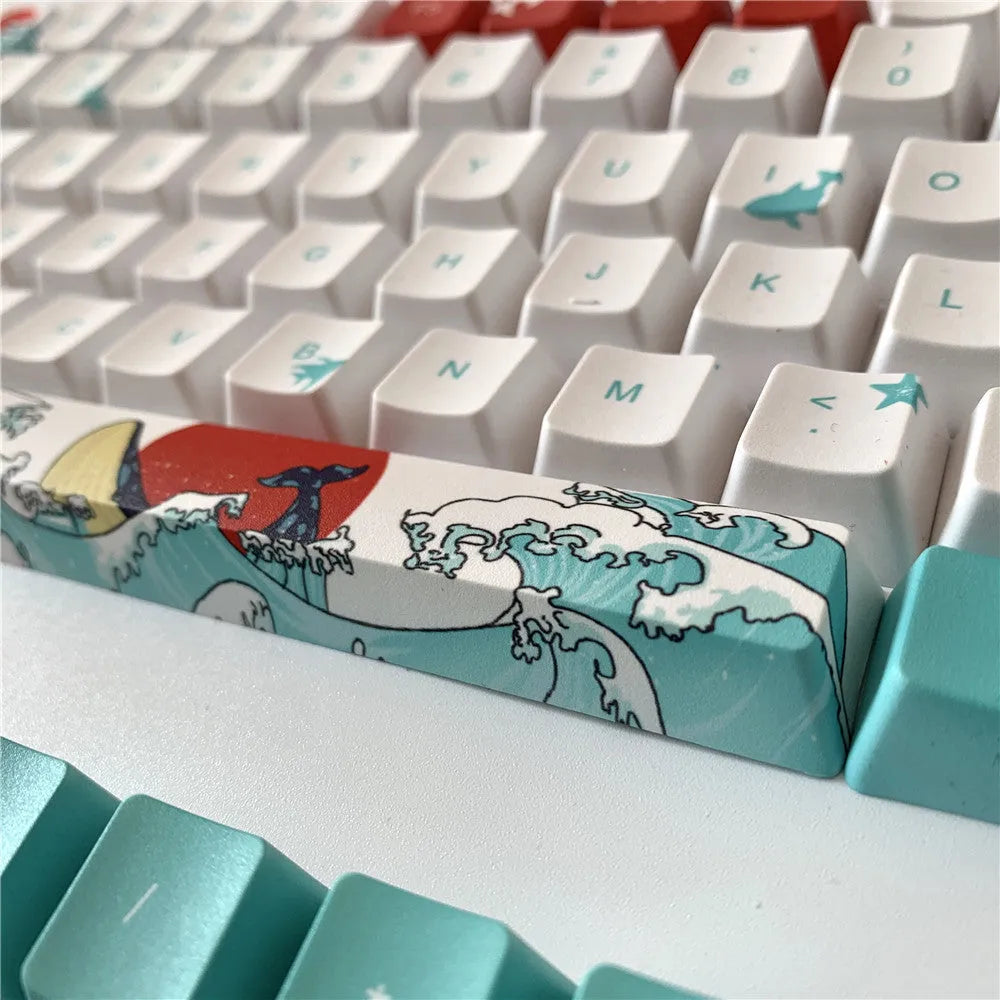 Coral Sea themed PBT plastic keycap set for mechanical keyboards, showing 104 colourful keys.