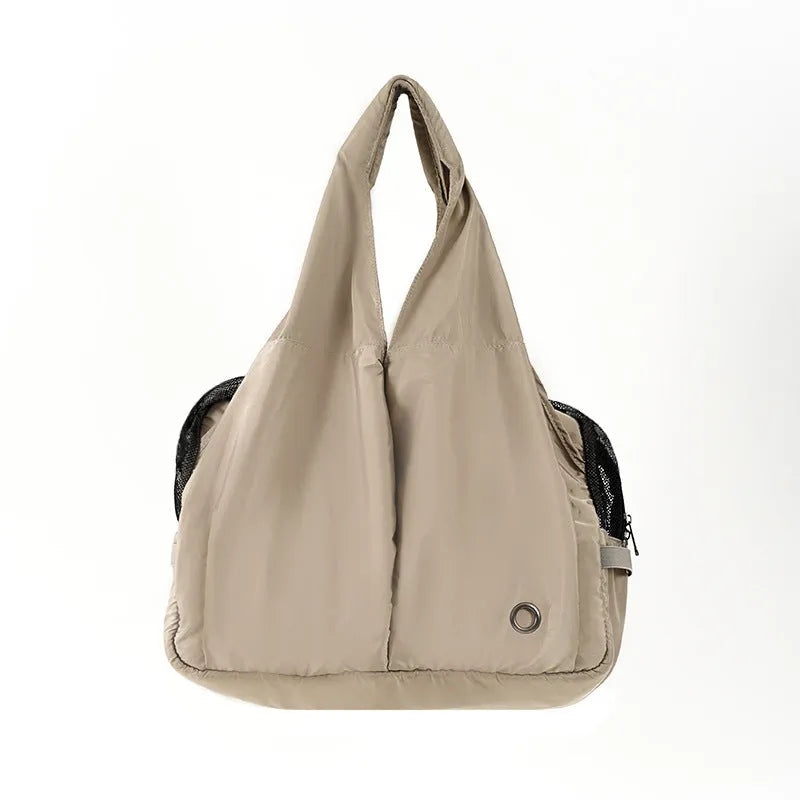 Apricot-coloured cloth pet carrier handbag showing medium dimensions of 41cm width