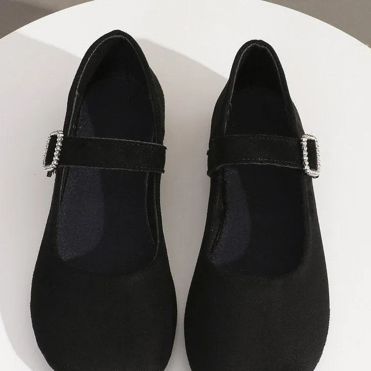 Men's black low-top canvas fisherman slip-on shoes with a flat rubber sole