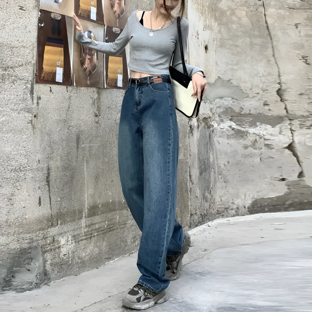 Women's retro blue high waist straight leg jeans laid flat, showing the five-pocket design and button fly.