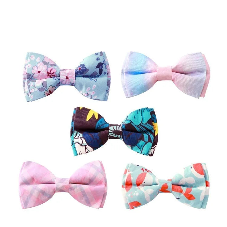 Polyester pet collar with rose gold metal buckle and attached decorative bow in cherry blossom blue colour