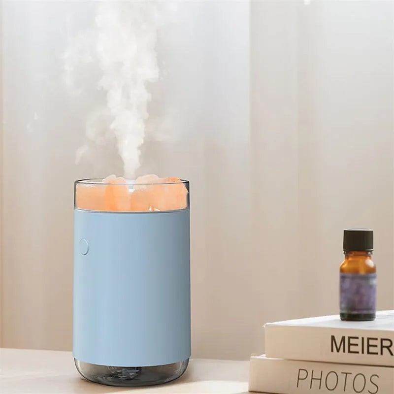 Ultrasonic humidifier diffuser with crystal salt stone and LED lamp in white finish on a desk with USB cable