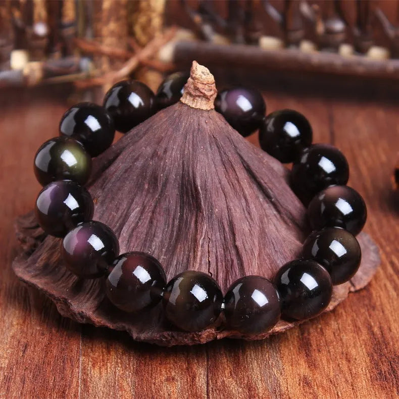 Polished crystal Pi Xiu bracelet with geometric beads in ethnic unisex style.