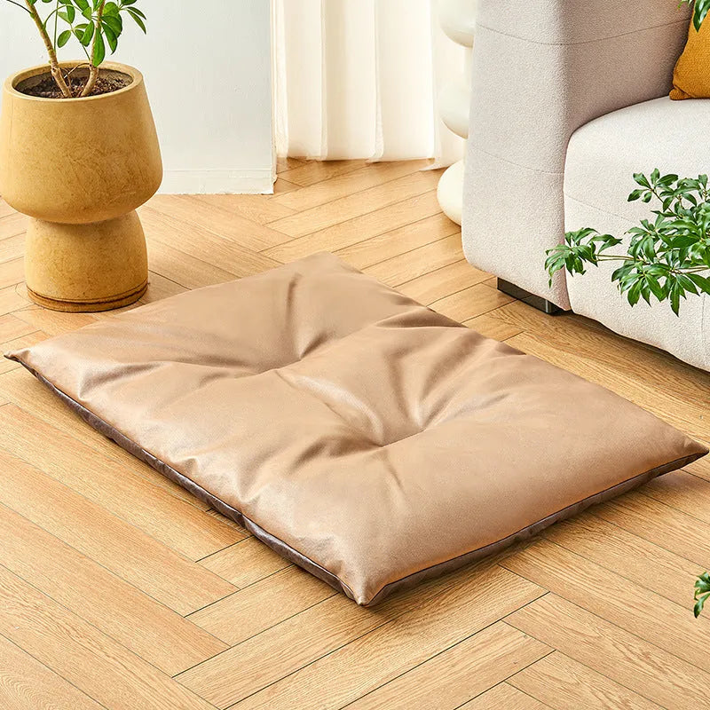 Blue pet bed sleeping mat for cats and small dogs in a nest style with raised edges.