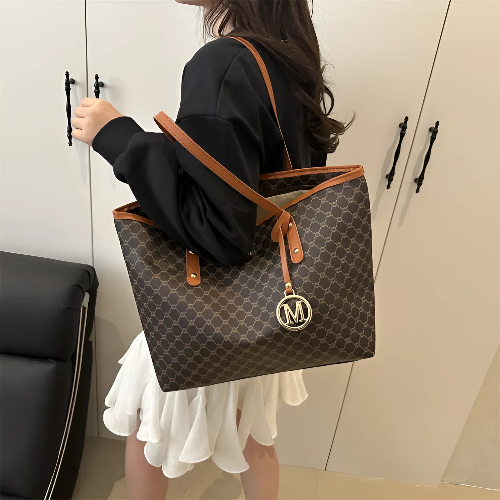 Western style black PU leather shoulder bag with sewing thread details and polyester lining.