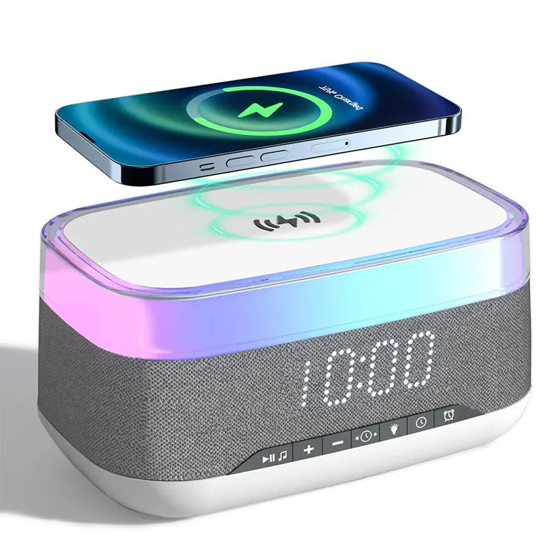 White multifunctional alarm clock with Bluetooth speaker and wireless charging pad for mobile phones