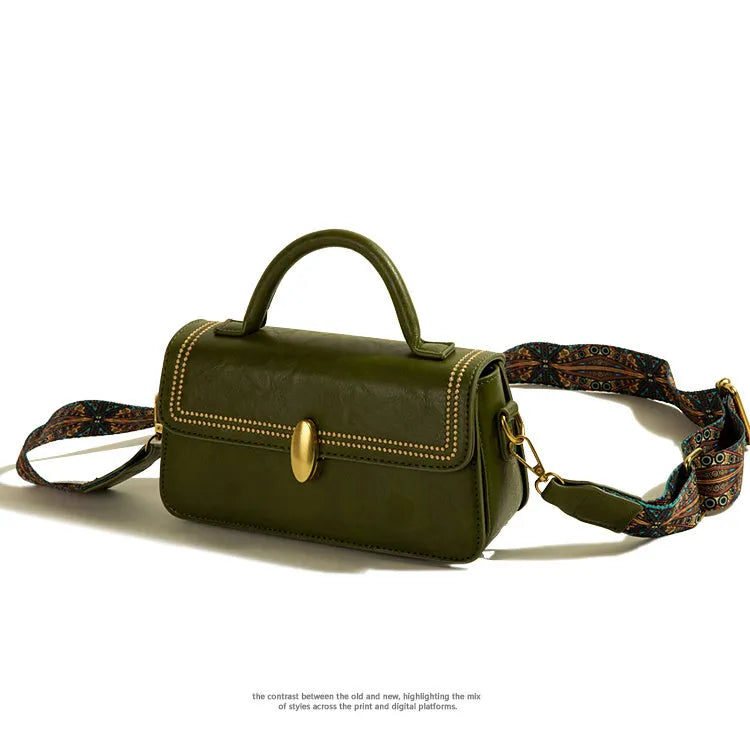 Brown retro messenger bag for women showing square vertical shape and external pocket