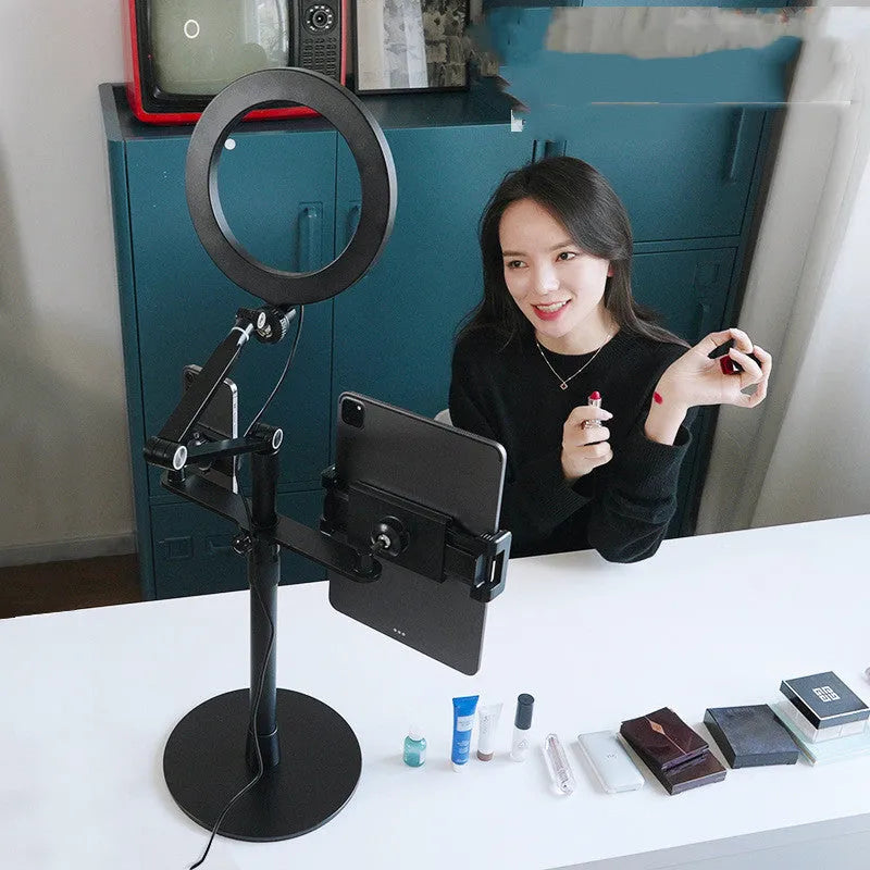 Black floor-standing phone tablet stand with two LED fill lights in vertical folded position
