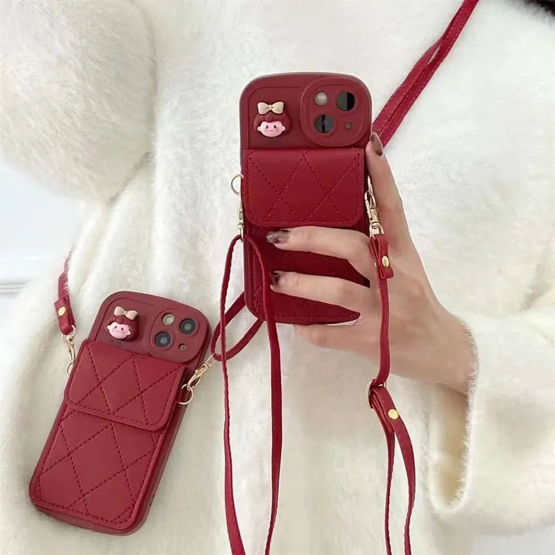 Red TPU crossbody card holder with lanyard for iPhone 15 showing diamond plaid pattern and rear card slot