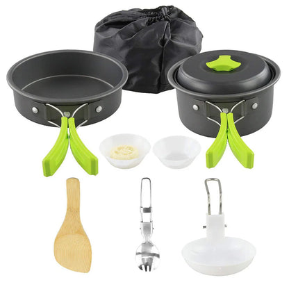 Aluminum camping cookware set with pots, pans, and utensils for outdoor cooking