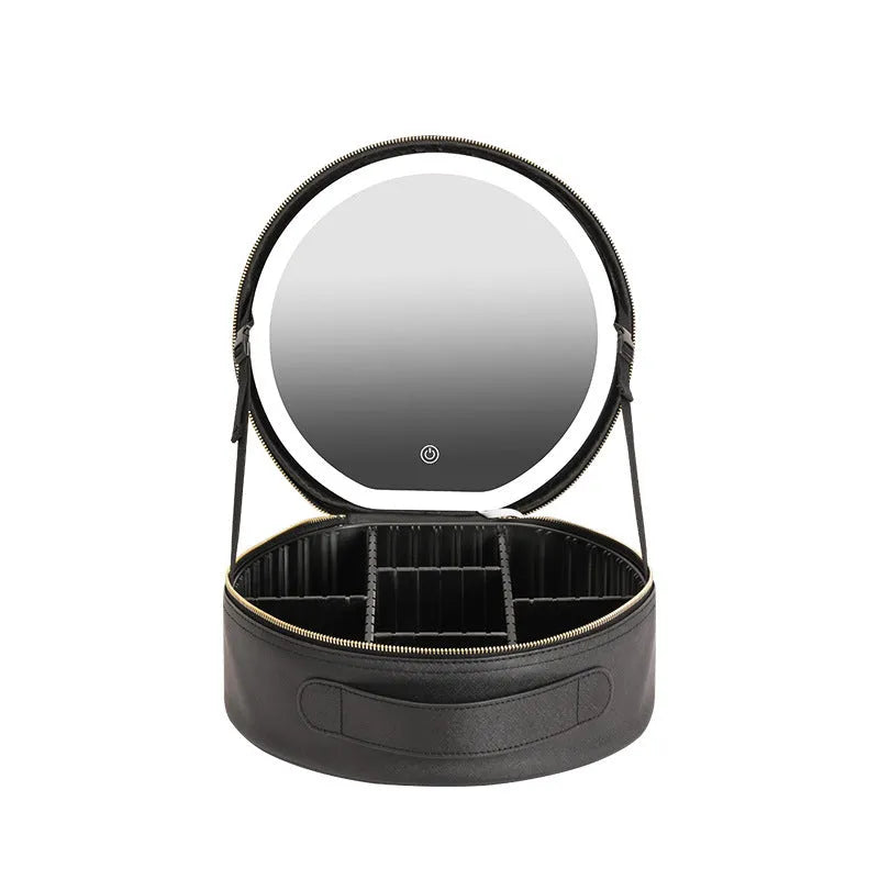 Round pink LED makeup bag open showing internal partitions and illuminated mirror.