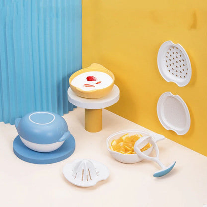 Manual baby food grinder set in blue and yellow with anti-slip rings