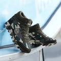 Women's green camouflage casual trainers with canvas upper and rubber sole
