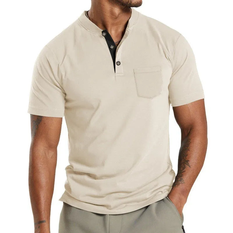 Plus size man wearing a light grey short sleeve polyester casual shirt with a button chest pocket.