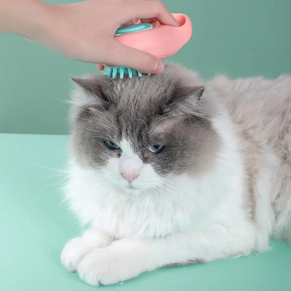 Claw-shaped pet grooming brush in pink, blue, yellow, and grey for cats and dogs