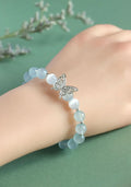 Women's crystal cat eye bracelet with butterfly charm and bow design in princess style