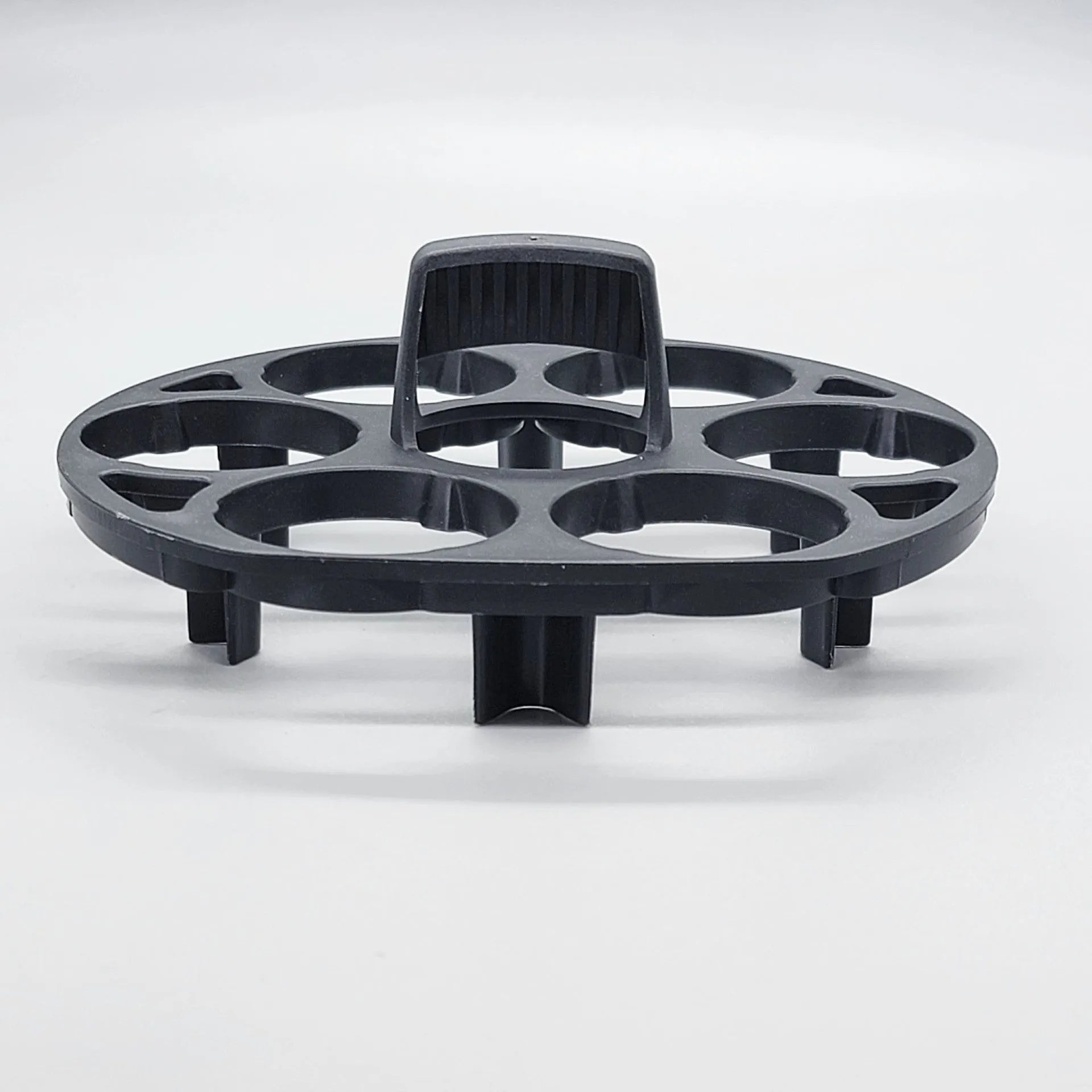 Black plastic egg holder with modern design measuring 13.8 by 12.6 by 5.7 centimetres