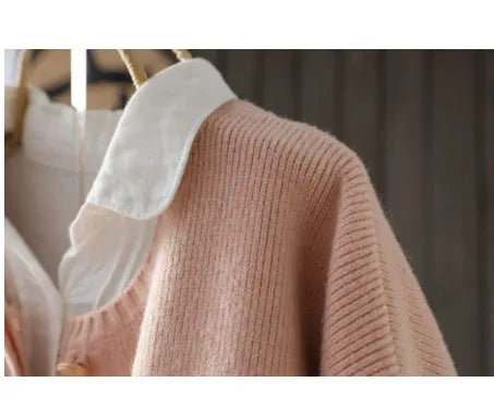 Long-sleeved knitted cardigan with button pocket, solid colour queen style, available in apricot, blue, and pink