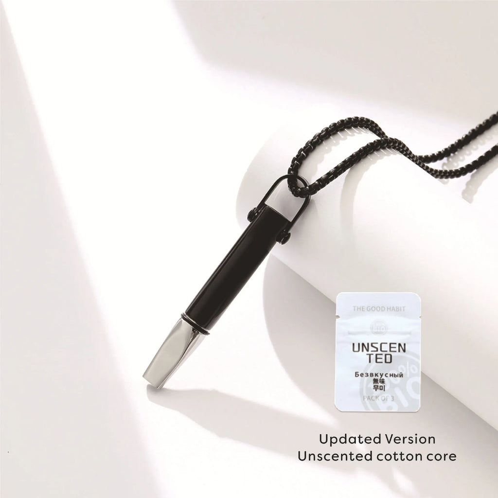 Titanium steel round tube breathing resistance whistle necklace with polished finish on pearl chain