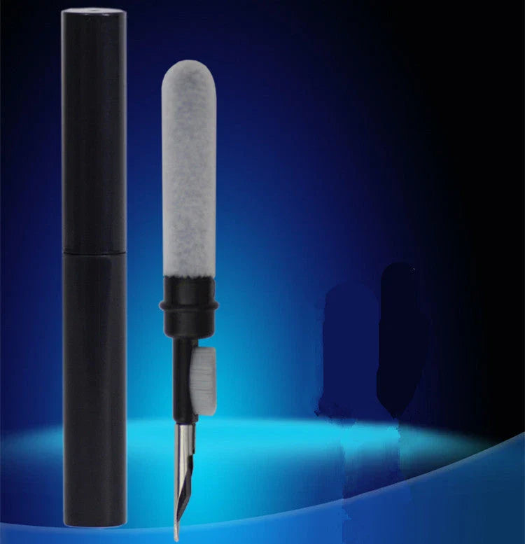 Versatile 4-in-1 keyboard cleaning brush with nylon bristles, flocking sponge, metal pen tip, and keycap puller for efficient cleaning of gaming equipment