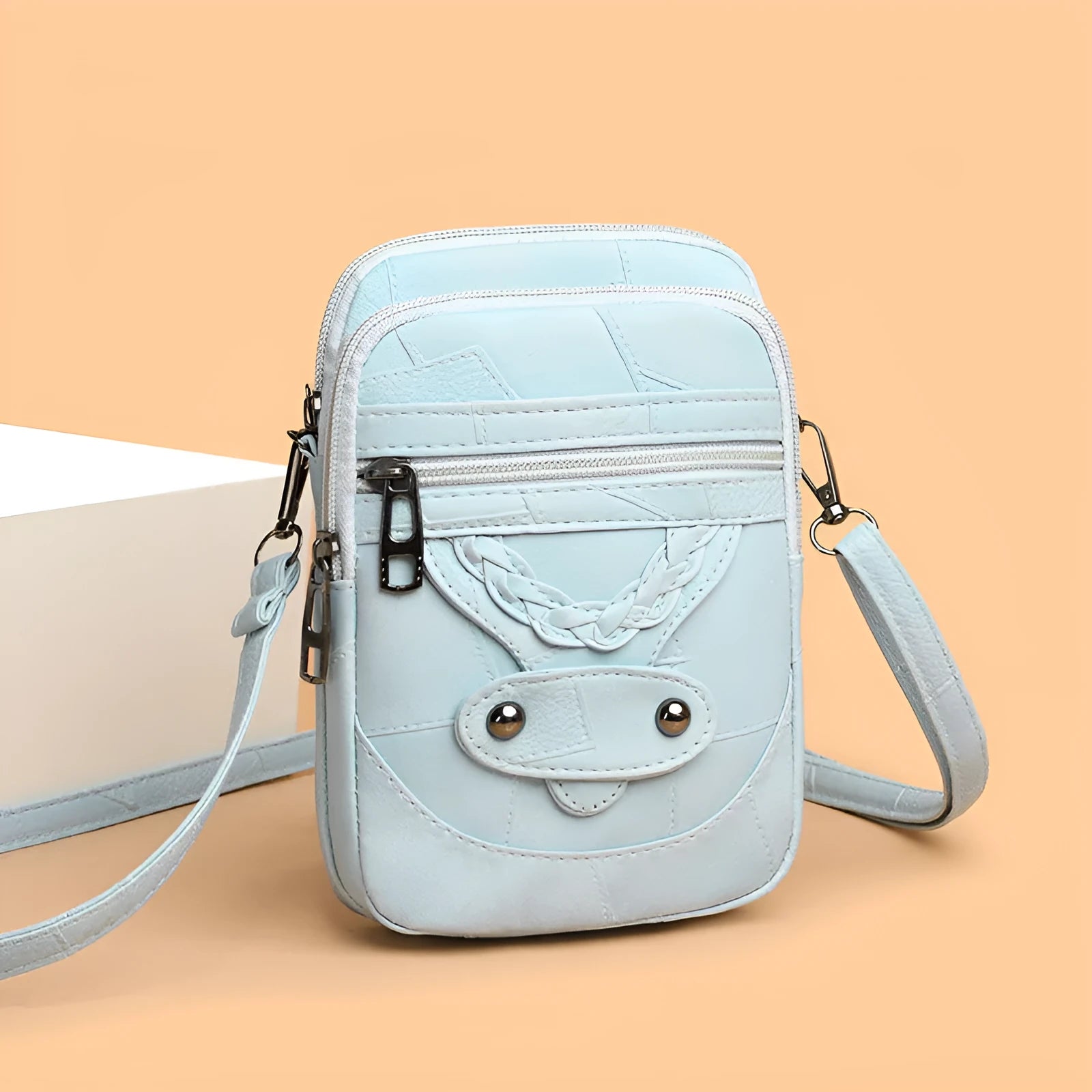 Soft PU retro mobile phone bag in vertical square shape with weaving and rivet details.