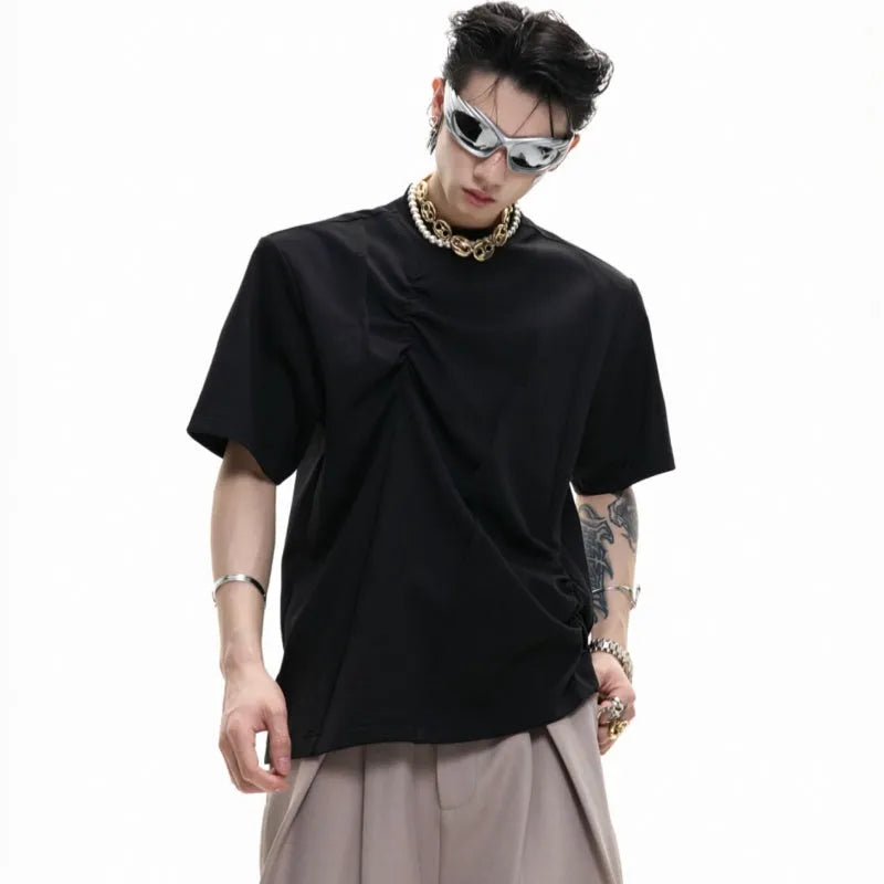 Men's grey loose fit cotton t-shirt with three-dimensional pleated texture detail on front.