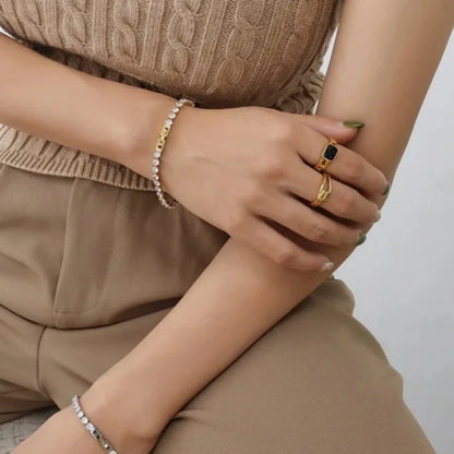 Women's titanium steel zircon bracelet with geometric design and double-safety clasps