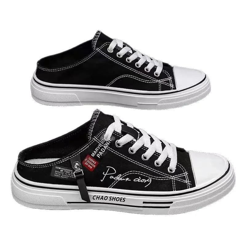 Men's black canvas slip-on casual shoes with round toe and injection moulded sole.