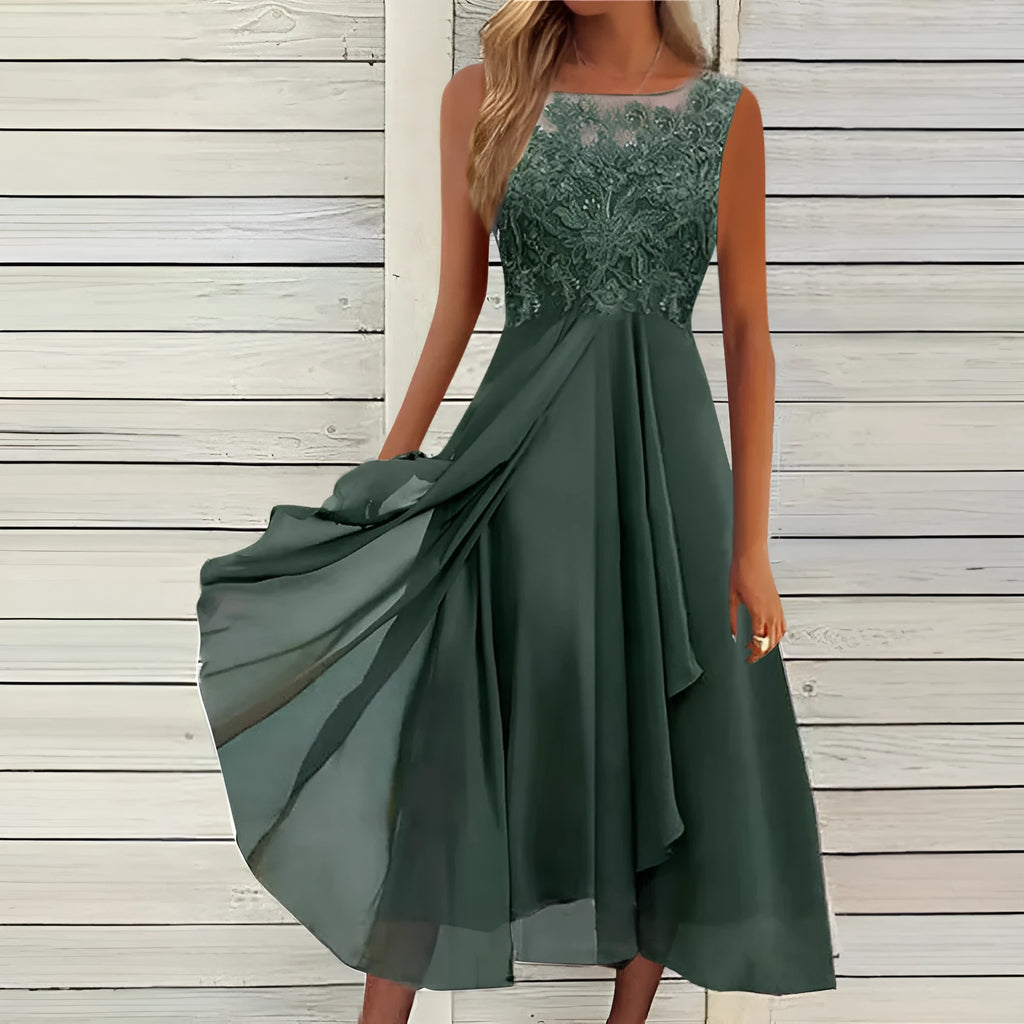 Women's sleeveless green chiffon dress with lace hollow-out stitching detail, midi length.