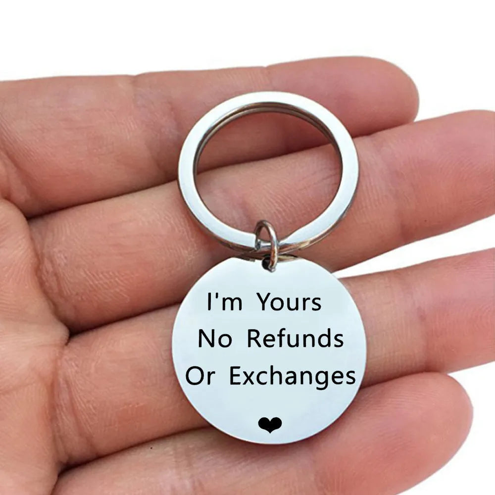 Titanium steel keychain 30mm width unisex design steel colour finish on white background