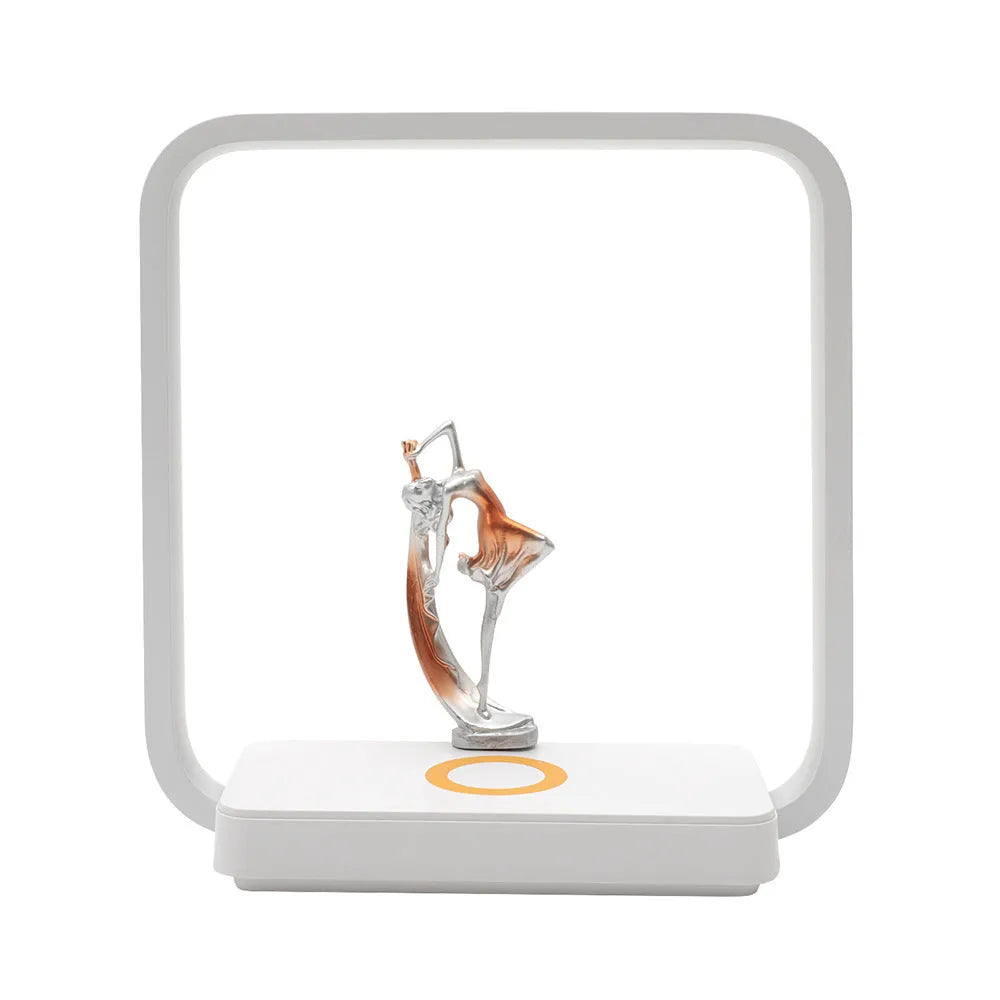 Blue atmosphere table lamp with wireless phone charging surface and decorative lighting