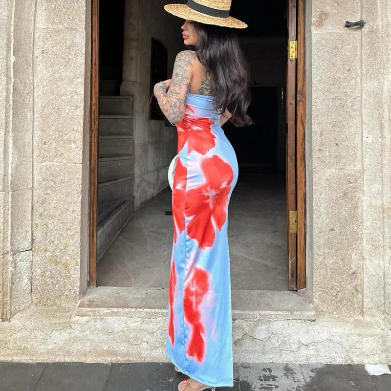 Chic slit maxi dress in various vibrant colors, featuring a high-waisted silhouette and flirty slit detail for a flattering and stylish summer look.